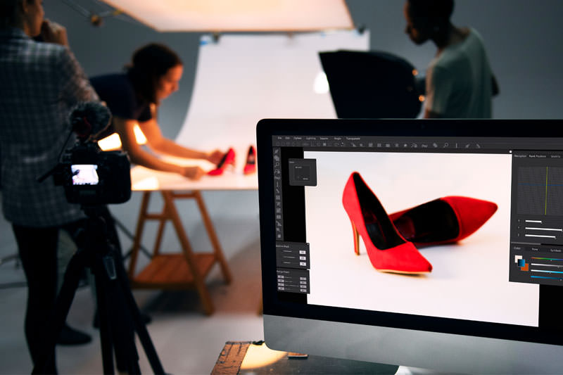 Pixecart is a global marketplace based in Australia that provides product-related vetted creative freelance services on demand. This image is showing you a group of photographers taking a photo of a pair of red high hell shoes for an ecommerce website and marketing.